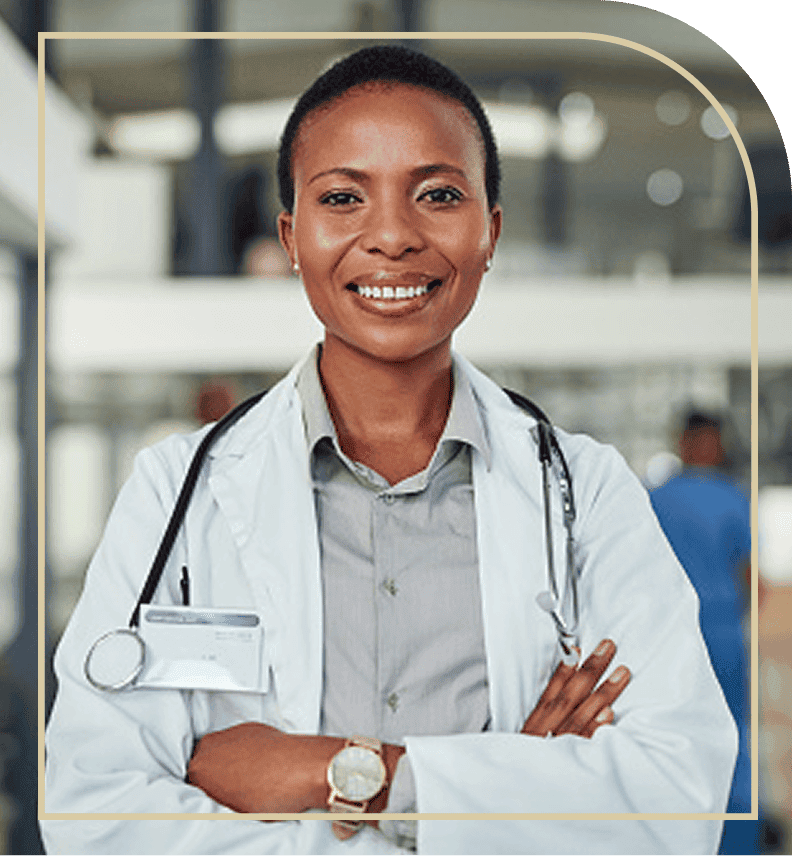 woman doctor smiling with her arms crossed