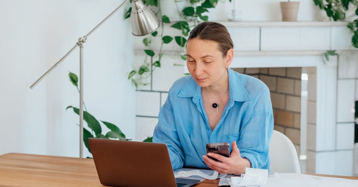 Woman smiling and reading